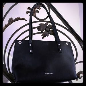 Calvin Klein REVERSIBLE faux leather shoulder bag                 style#H8GAZ8HX